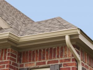 Installation of gutters on the edge of the roof