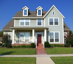 A house having main entry door with frontside lawn area