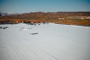 Top view of white flat roofing.