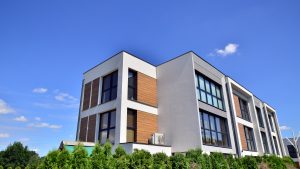 Apartment building with a blue sky.